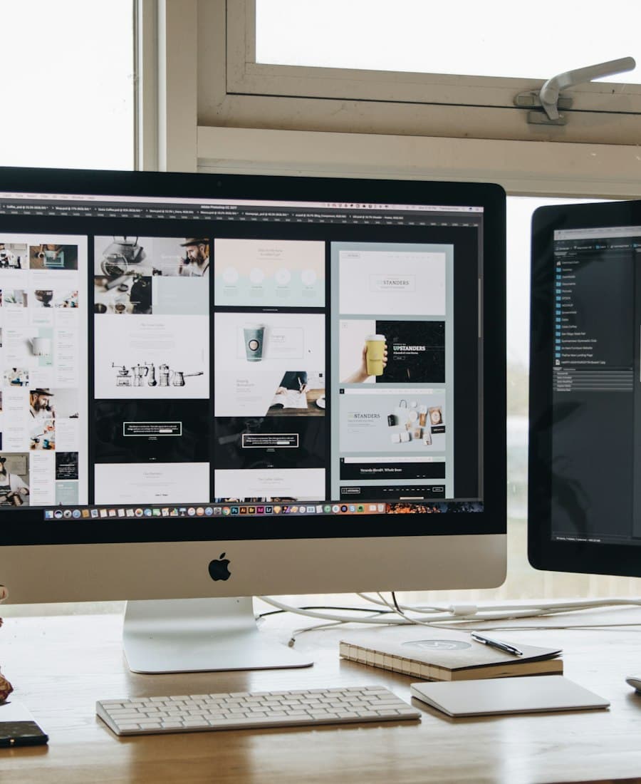 A designer's dual-monitor workspace used to build fast, conversion-focused websites